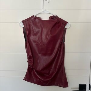 Tag on super cute faux leather maroon top